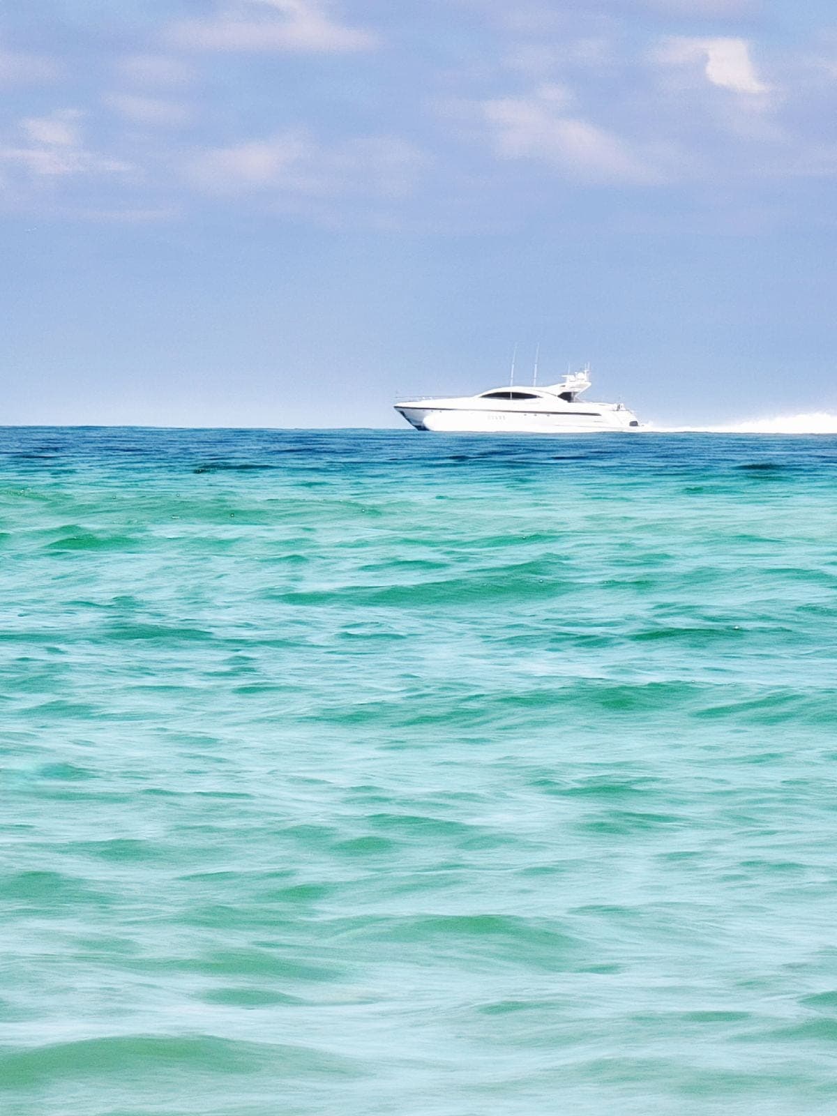 Superyacht on the turquoise Atlantic off South Beach